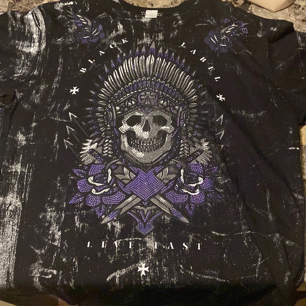 Black lable slightly worn.